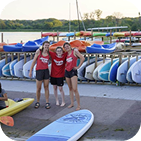 people in front of boats
